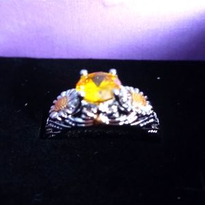 Silver tone ring with Yellow stone and Flower Detail